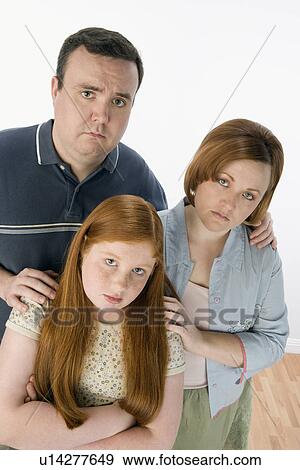 Portrait of sad family View Large Photo Image Stock Photo - Portrait of sad family. Fotosearch