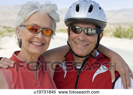Stock Photography - Portrait of Senior couple in sportswear. Fotosearch