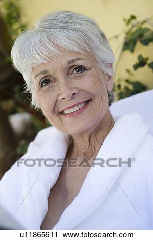 Portrait of senior woman in bathrobe at health spa View Large Photo Image Stock Image - Portrait of senior woman in bathrobe at health spa. Fotosearch
