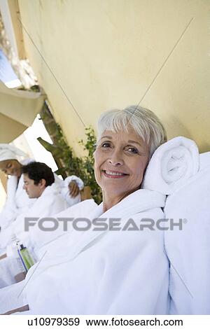 Portrait of senior woman in bathrobe at health spa View Large Photo Image Stock Photo - Portrait of senior woman in bathrobe at health spa. Fotosearch