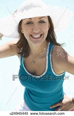Stock Photography - Portrait of Teenage Girl (18-19) in Sunhat. Fotosearch