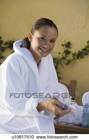 Portrait of woman in bathrobe View Large Photo Image Stock Image - Portrait of woman in bathrobe. Fotosearch