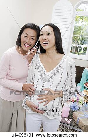 Pregnant Asian Woman with Mother at a Baby Shower View Large Photo Image Stock Image - Pregnant Asian Woman with Mother at a Baby Shower. Fotosearch