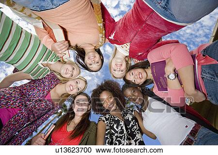 Ring of female friends outdoors, (portrait) View Large Photo Image Stock Image - Ring of female friends outdoors, (portrait). Fotosearch