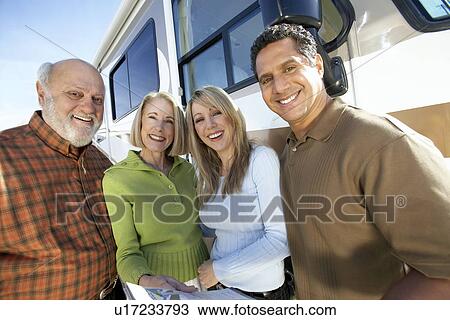 Salesperson with family shopping for RV, group portrait View Large Photo Image Stock Image - Salesperson with family shopping for RV, group portrait. Fotosearch