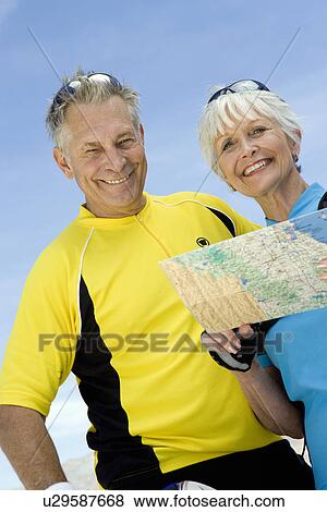 Senior couple reading map View Large Photo Image Stock Photo - Senior couple reading map. Fotosearch