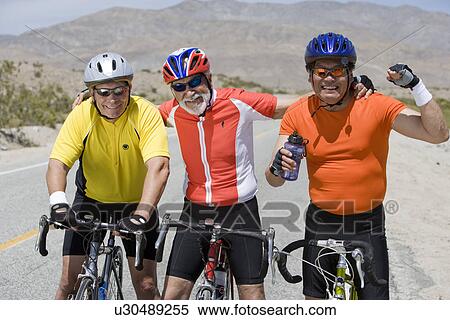 Senior men cycling View Large Photo Image Stock Photography - Senior men cycling. Fotosearch