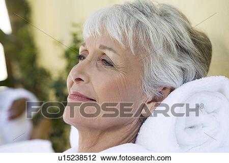Senior woman relaxing at health spa View Large Photo Image Stock Image - Senior woman relaxing at health spa. Fotosearch