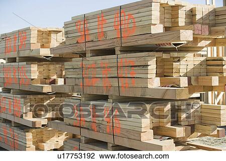 Stack of wooden planks View Large Photo Image Stock Image - Stack of wooden planks. Fotosearch