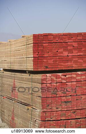 Stack of wooden planks View Large Photo Image Stock Photo - Stack of wooden planks. Fotosearch