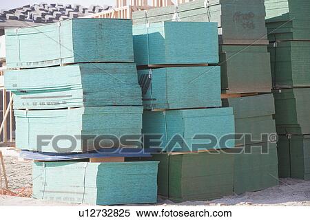 Stack of wooden planks View Large Photo Image Stock Photography - Stack of wooden planks. Fotosearch