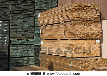 Stock Photography - Stacks of wood in warehouse. Fotosearch