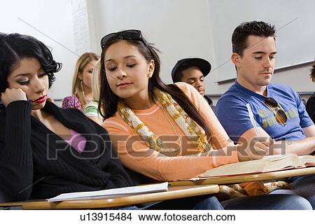 Picture - Student cheating in examination. Fotosearch