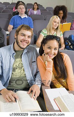 Students in lecture hall, (portrait) View Large Photo Image Stock Photo - Students in lecture hall, (portrait). Fotosearch