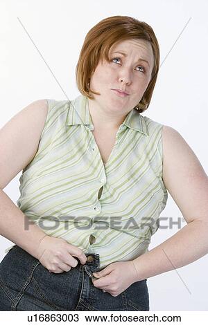 Studio portrait of overweight woman View Large Photo Image Stock Image - Studio portrait of overweight woman. Fotosearch