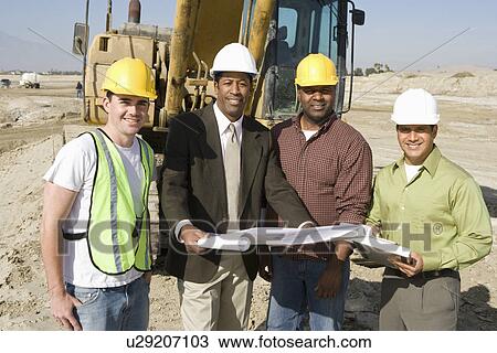 Surveyor and construction workers on site, portrait View Large Photo Image Stock Image - Surveyor and construction workers on site, portrait. Fotosearch