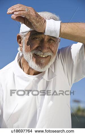 Picture - Tennis player sweating. Fotosearch