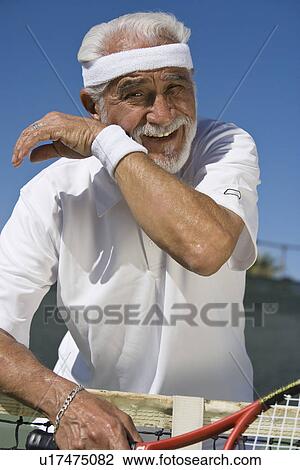 Stock Image - Tennis player sweating. Fotosearch
