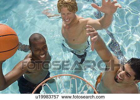 Stock Photo - Three Man Playing Water Basketball. Fotosearch