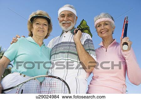 Three tennis players, portrait View Large Photo Image Picture - Three tennis players, portrait. Fotosearch