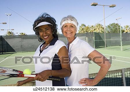 Two female tennis players View Large Photo Image Stock Photo - Two female tennis players. Fotosearch
