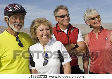 Stock Image - Two Senior couples in sportswear. Fotosearch