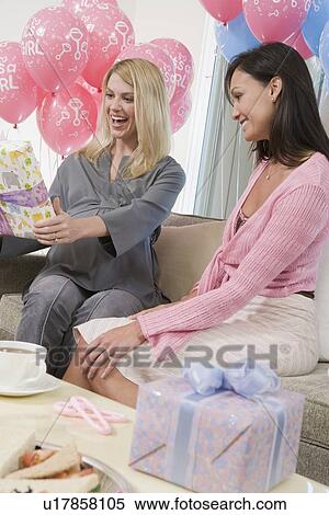 Two Women at a Baby Shower View Large Photo Image Stock Photography - Two Women at a Baby Shower. Fotosearch