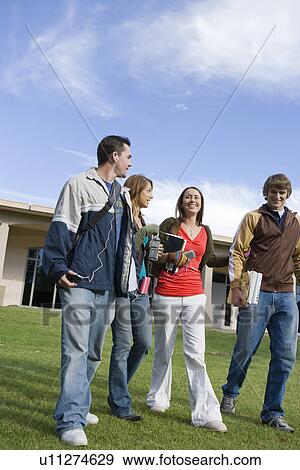 Stock Photo - University students walking, outdoors. Fotosearch