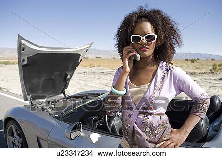Picture - Woman Having Car Trouble. Fotosearch