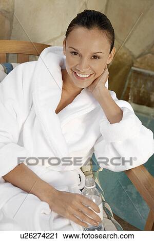 Woman in bathrobe relaxing in spa, half length View Large Photo Image Stock Image - Woman in bathrobe relaxing in spa, half length. Fotosearch