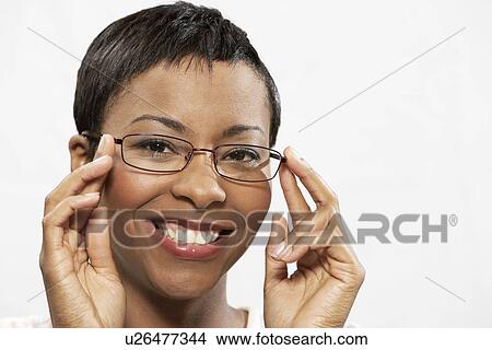 Woman in glasses, portrait, head and shoulders View Large Photo Image Picture - Woman in glasses, portrait, head and shoulders. Fotosearch
