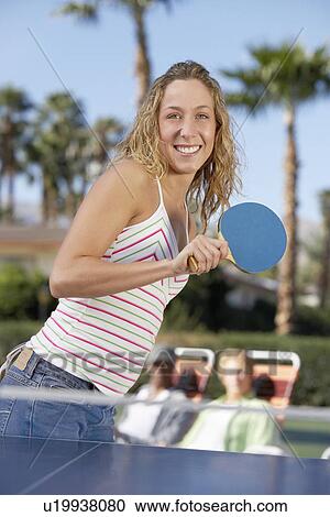 Woman playing table tennis View Large Photo Image Stock Image - Woman playing table tennis. Fotosearch
