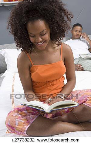 Woman Reading in Bed View Large Photo Image Stock Image - Woman Reading in Bed. Fotosearch