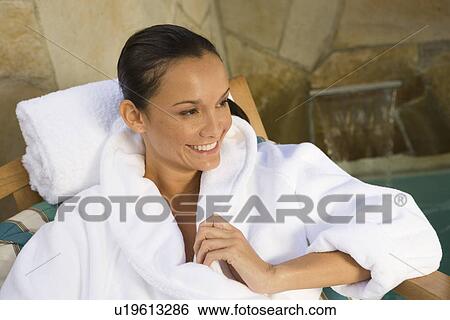Woman relaxing outdoors View Large Photo Image Stock Photograph - Woman relaxing outdoors. Fotosearch