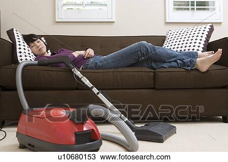 Woman sleeping after vacuuming View Large Photo Image Stock Image - Woman sleeping after vacuuming. Fotosearch