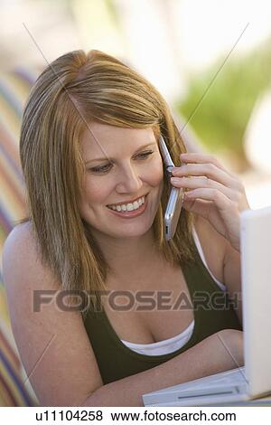 Woman Using Cell Phone View Large Photo Image Stock Photo - Woman Using Cell Phone. Fotosearch