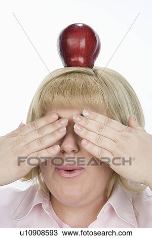 Woman with Apple on Head View Large Photo Image Stock Image - Woman with Apple on Head. Fotosearch