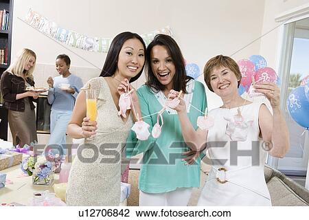 Stock Image - Women at a Baby Shower. Fotosearch