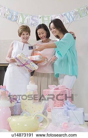 Stock Image - Women at a Baby Shower. Fotosearch