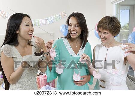 Stock Image - Women at a Baby Shower. Fotosearch