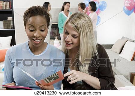 Stock Image - Women at a Baby Shower. Fotosearch