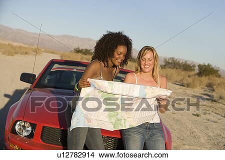Women Looking at Road Map View Large Photo Image Picture - Women Looking at Road Map. Fotosearch