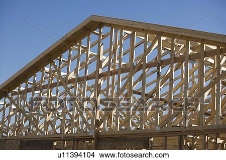 Picture - Wooden house construction. Fotosearch