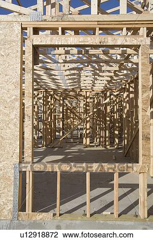 Wooden house construction View Large Photo Image Stock Image - Wooden house construction. Fotosearch