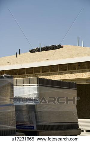 Stock Photography - Wooden house construction. Fotosearch