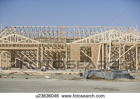 Wooden house constructions View Large Photo Image Stock Photograph - Wooden house constructions. Fotosearch