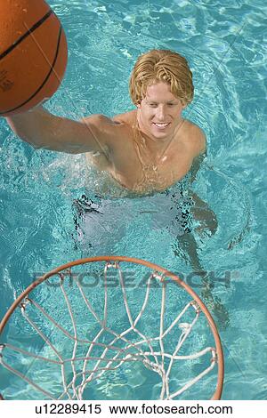 Young Man Playing Water Basketball View Large Photo Image Stock Photography - Young Man Playing Water Basketball. Fotosearch