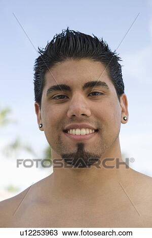 Young Man Smiling, Portrait View Large Photo Image Stock Image - Young Man Smiling, Portrait. Fotosearch
