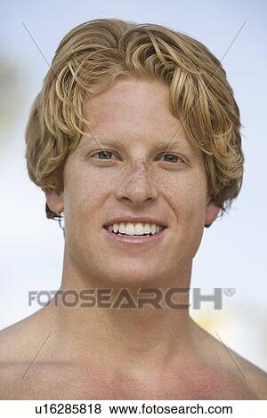 Stock Photo - Young Man Smiling, Portrait. Fotosearch