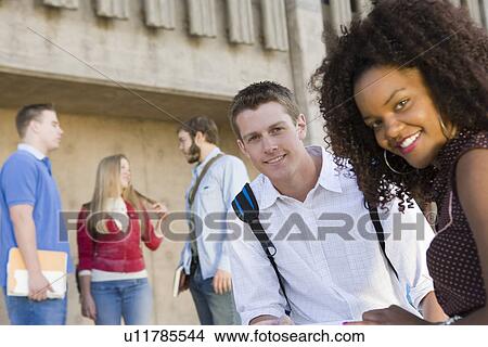 Young students having a break View Large Photo Image Picture - Young students having a break. Fotosearch